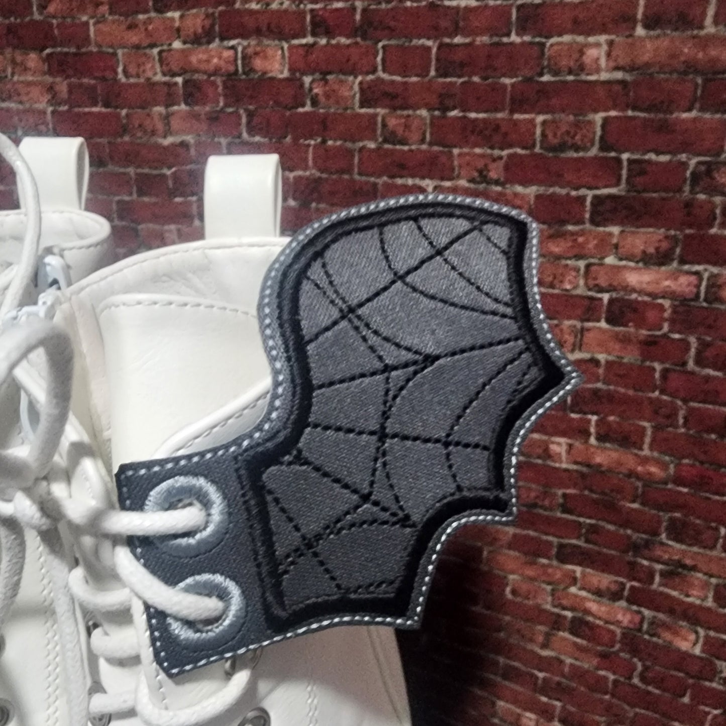 Stained glass bat shoe wing