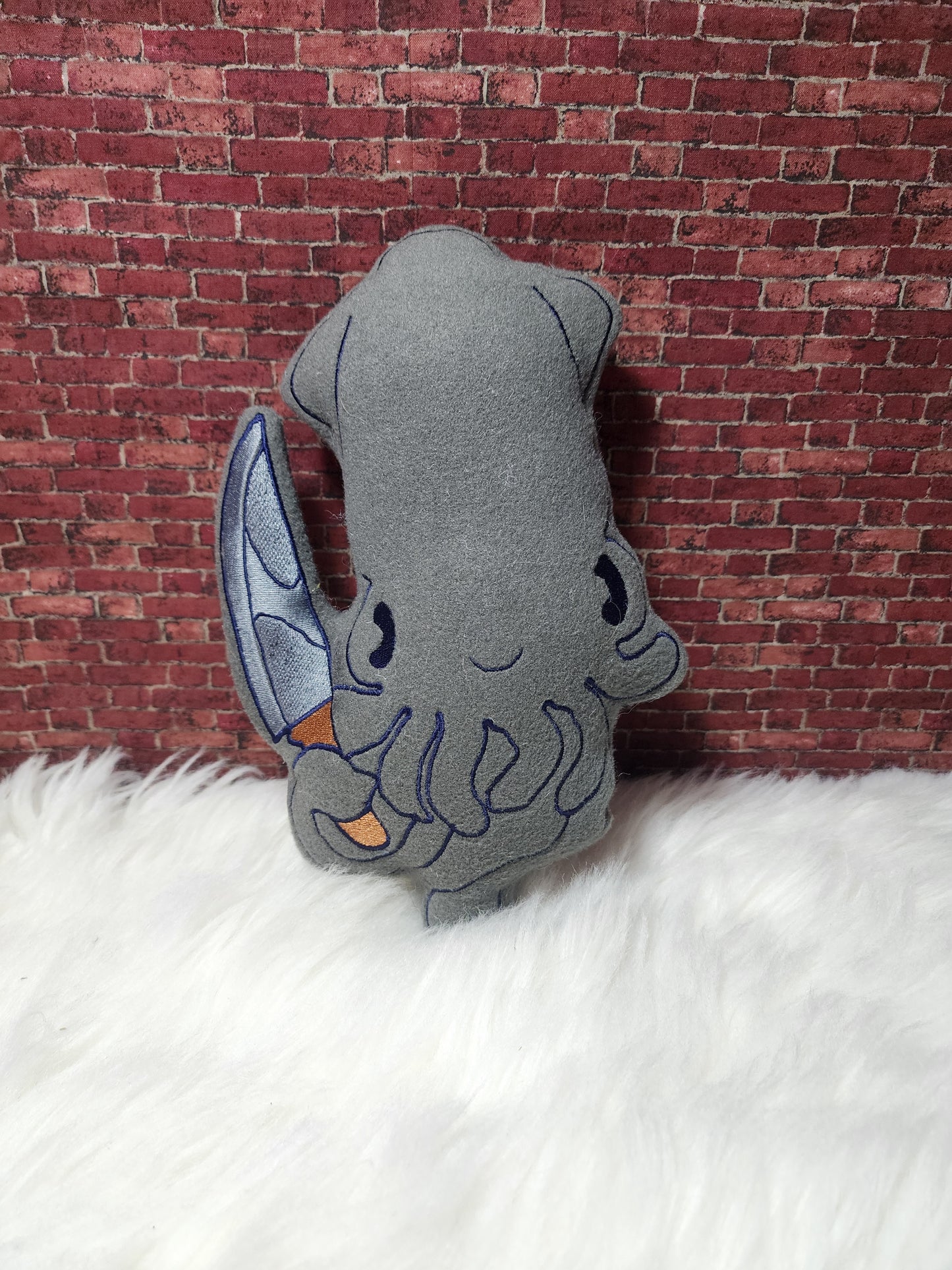Squid with knife plushie