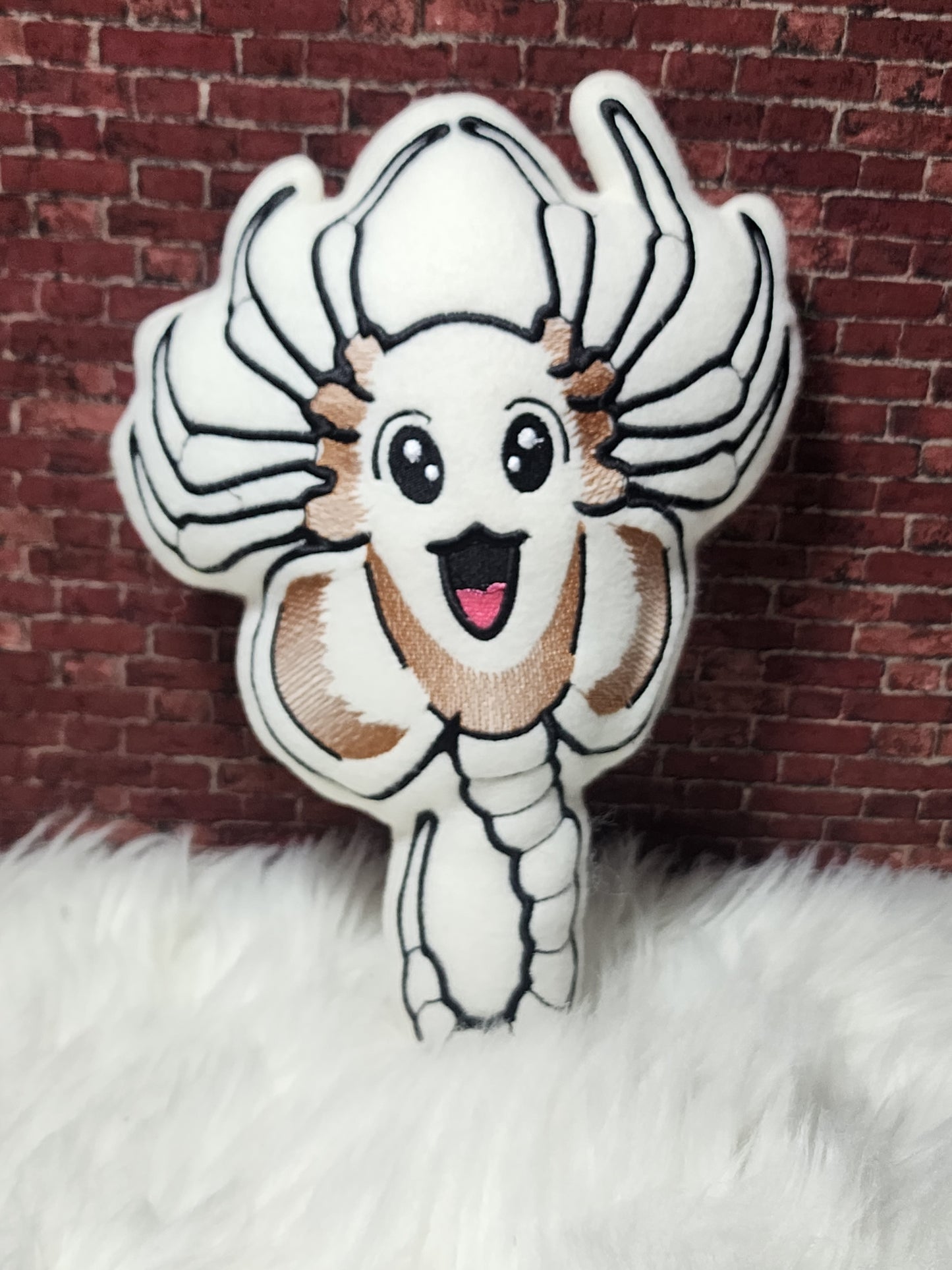 Face hugger plushie
