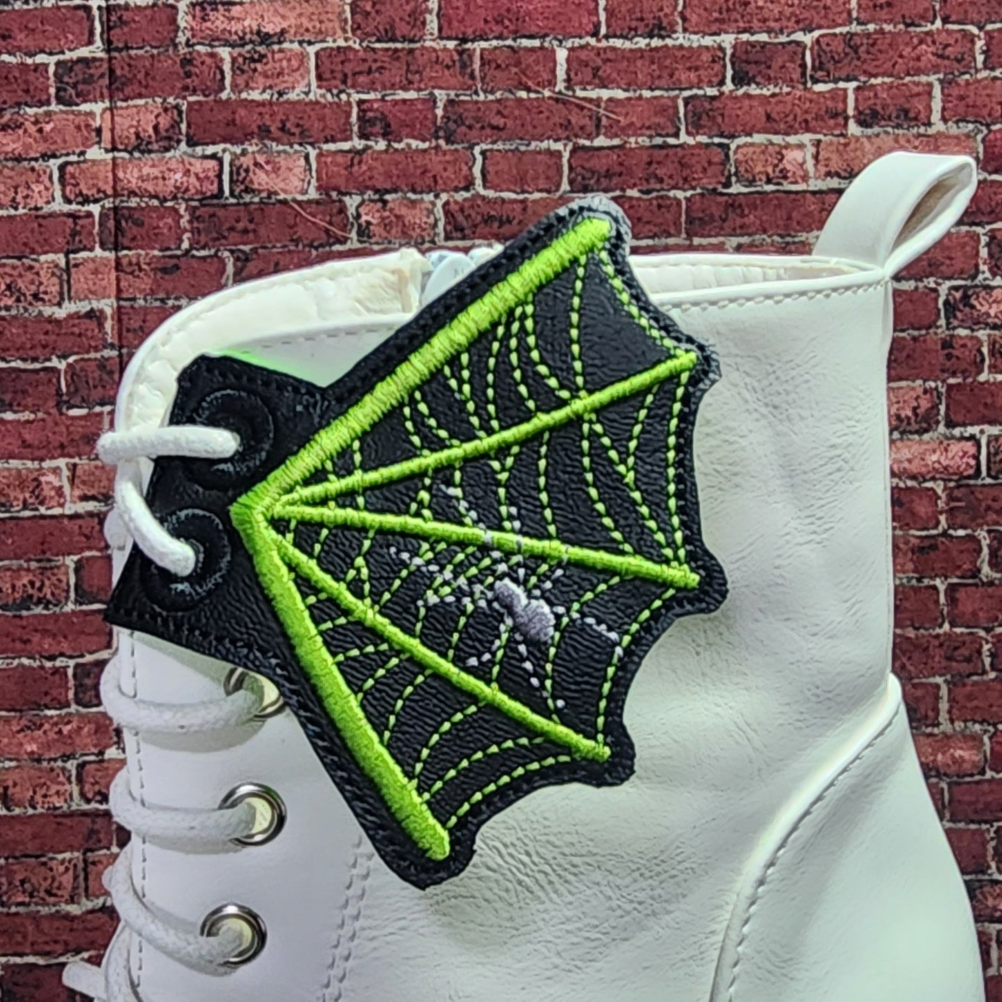 Spider web -shoe wings